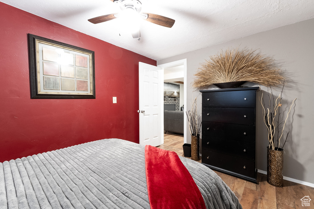 Bedroom featuring ceiling fan and light wood-style floors