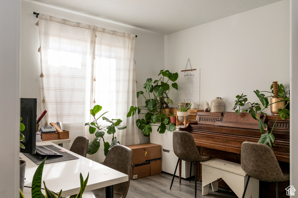 Office area with wood finished floors
