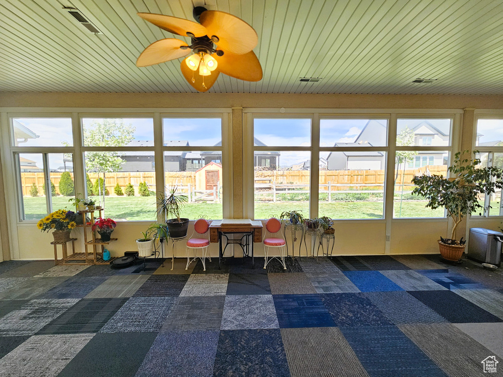 Sunroom / solarium featuring visible vents