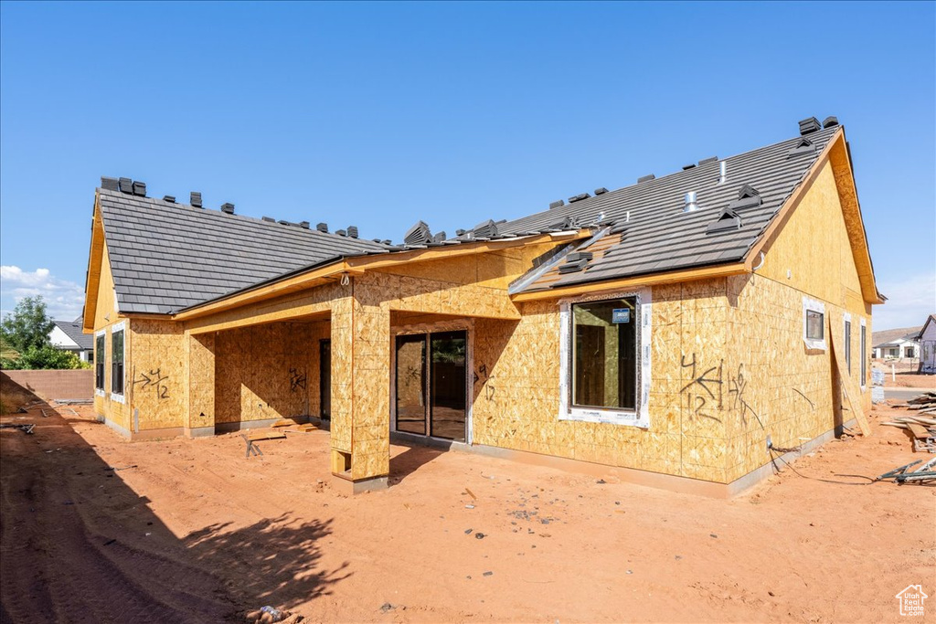 Back of property featuring a patio area