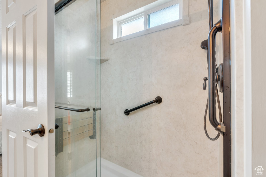 Bathroom featuring a shower stall