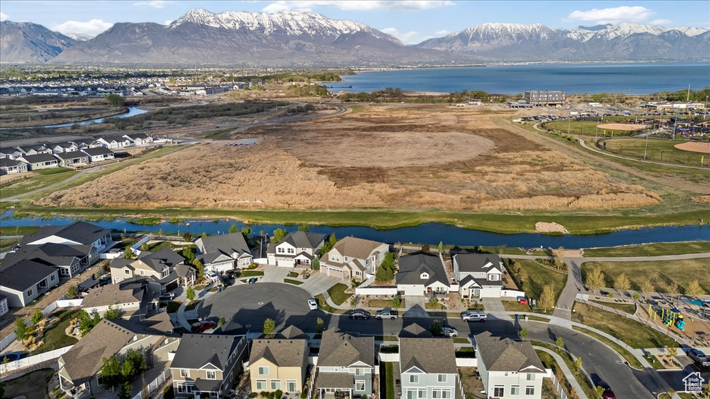 Aerial view with a water and mountain view