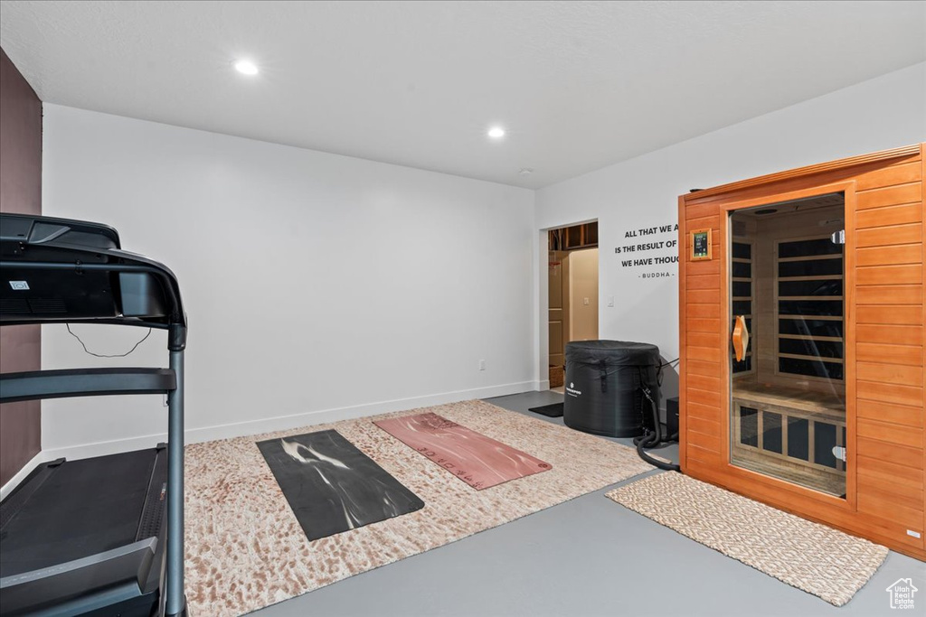 Exercise room featuring recessed lighting