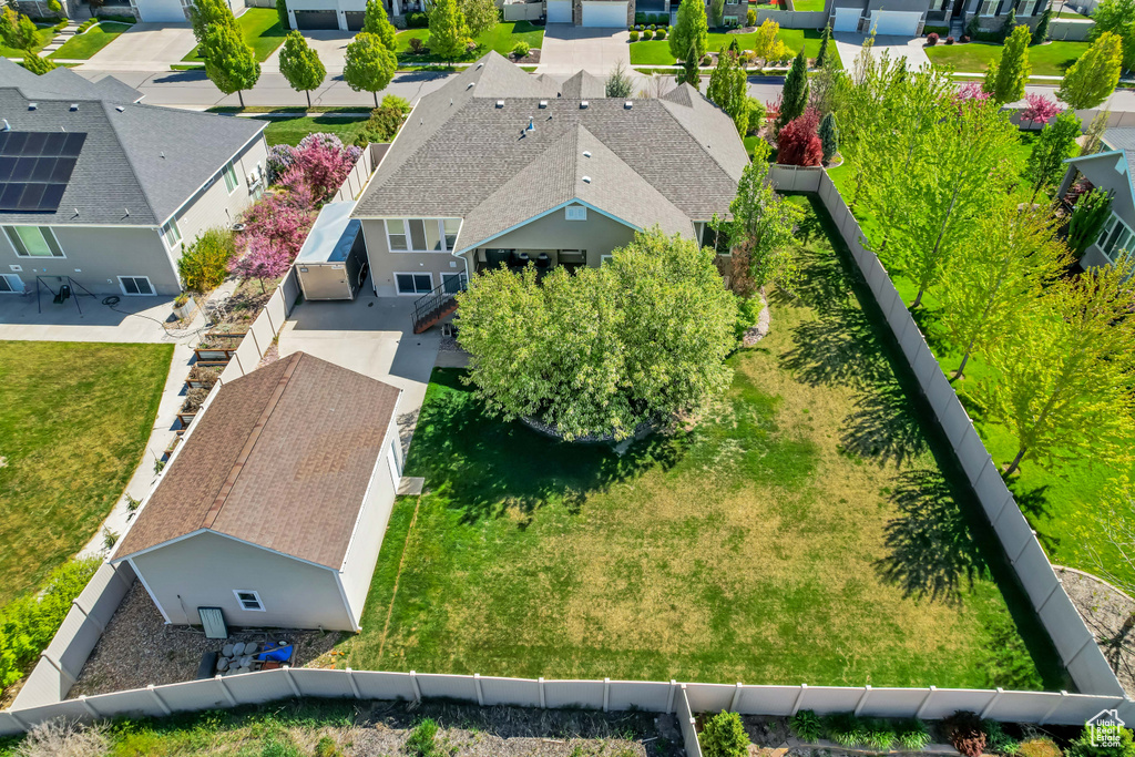Birds eye view of property with a residential view