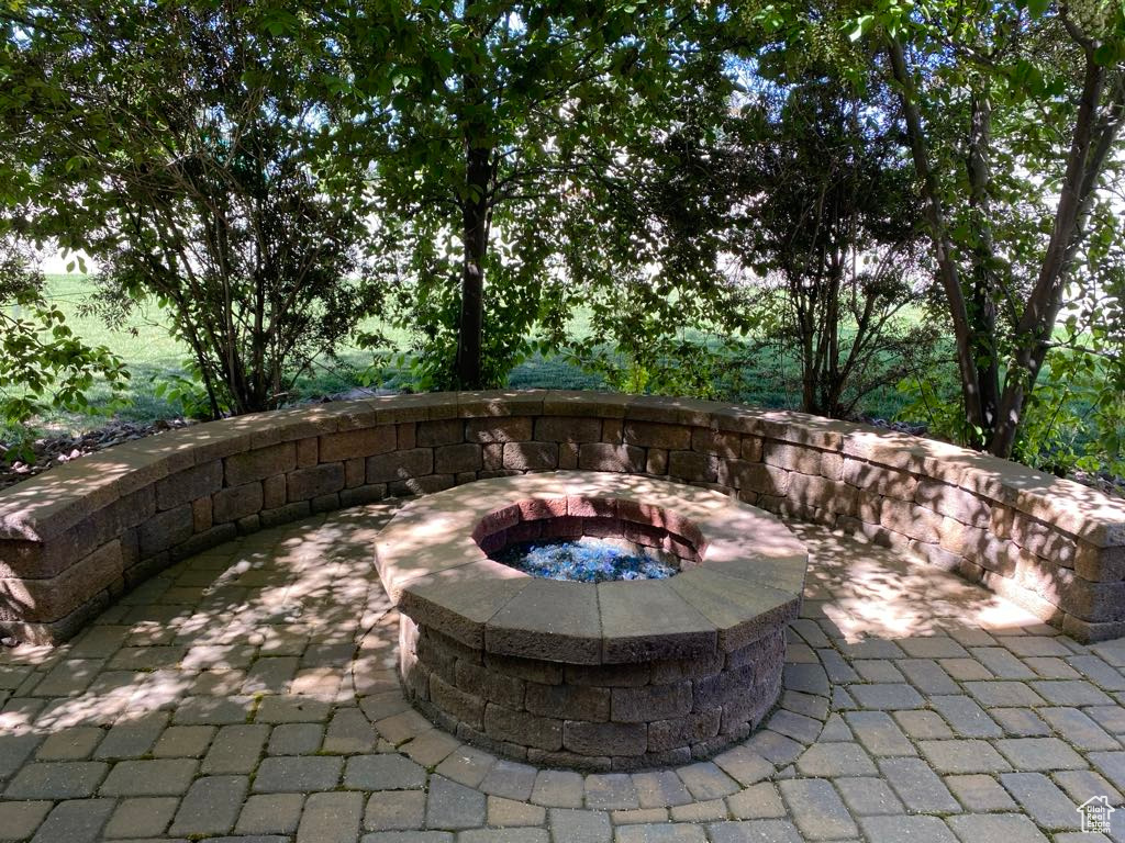 View of patio / terrace with a fire pit