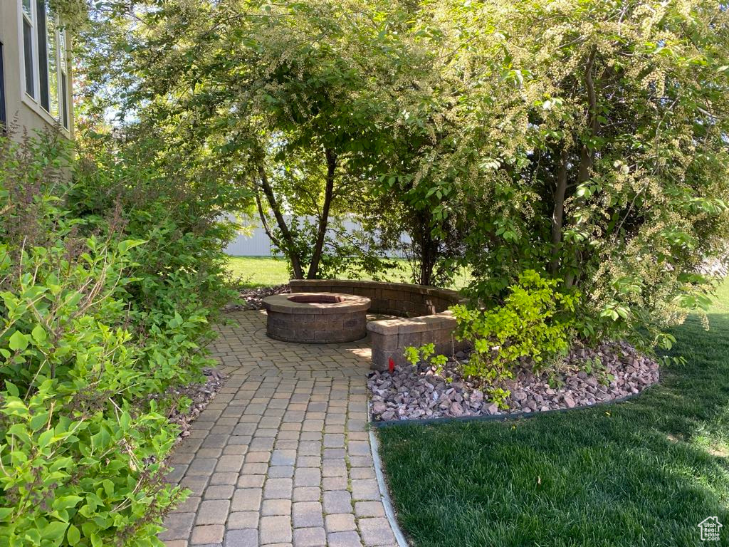 View of patio / terrace with an outdoor fire pit