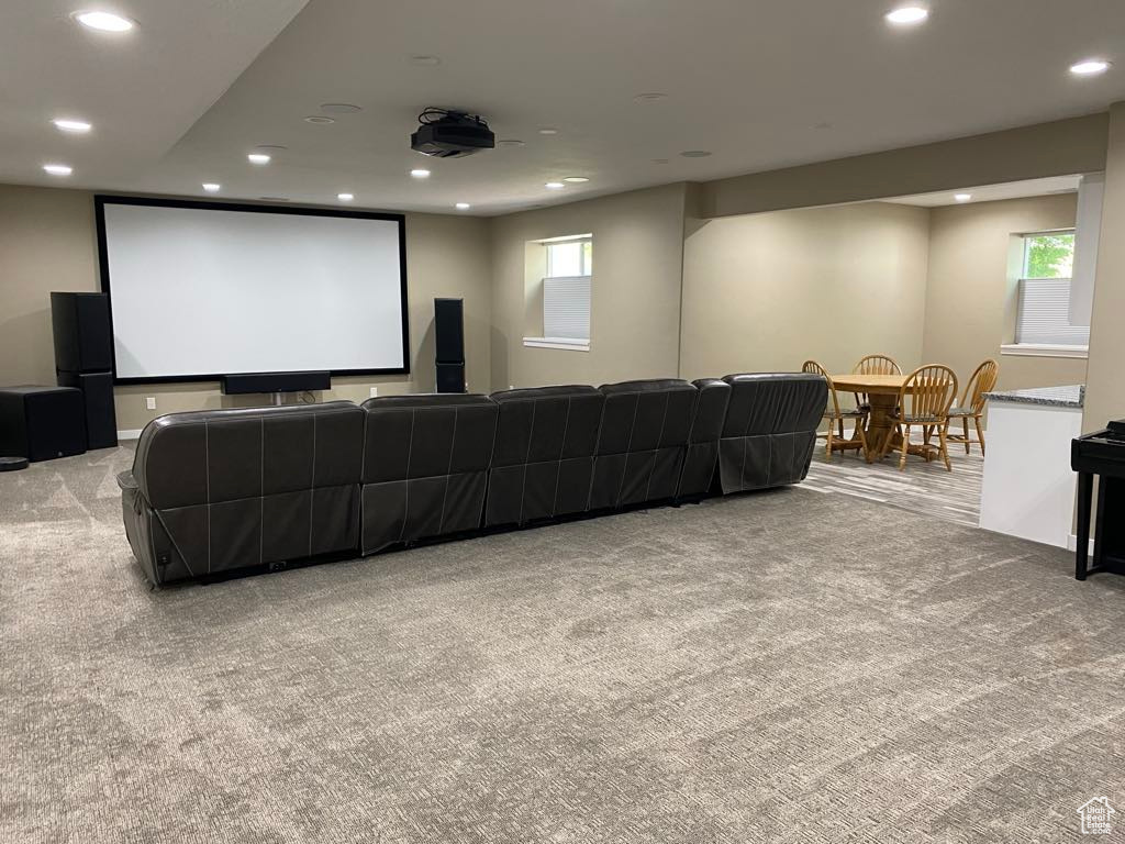 Home theater featuring carpet floors and recessed lighting