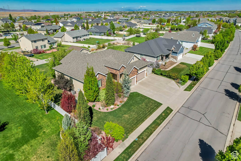 Birds eye view of property with a residential view