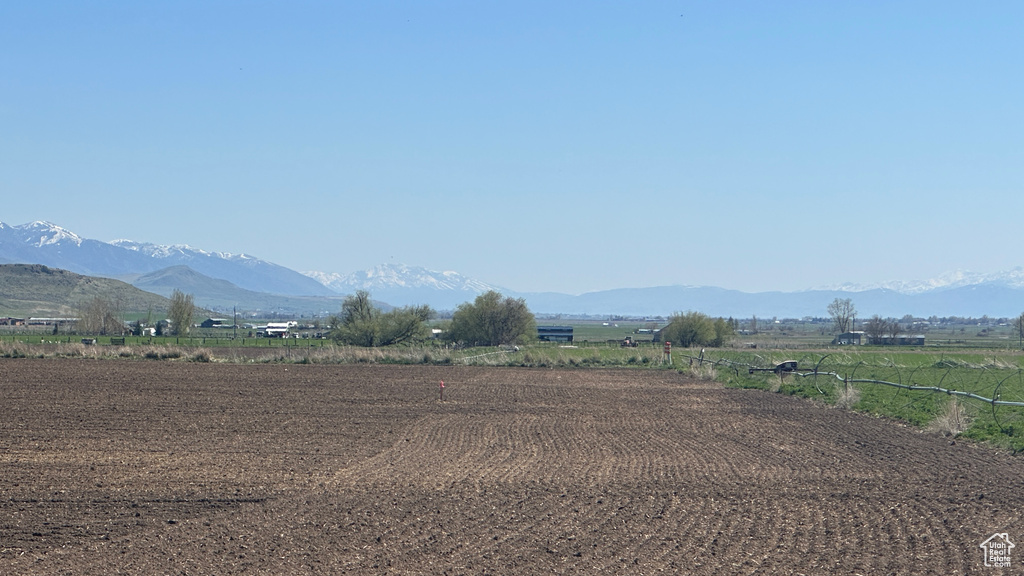 Property view of mountains with a rural view