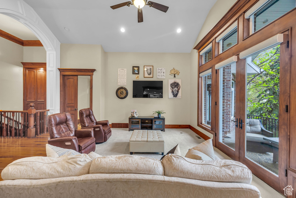 Living area with baseboards, ceiling fan, french doors, and recessed lighting