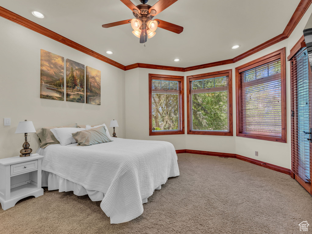 Bedroom featuring baseboards, ornamental molding, carpet flooring, and recessed lighting