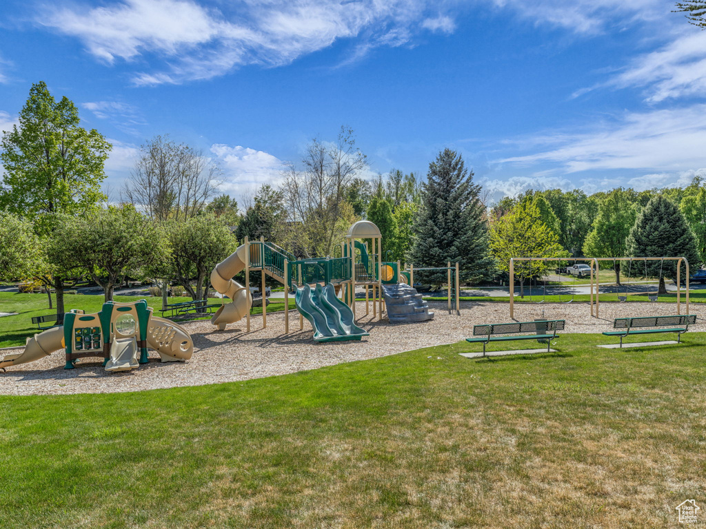 Communal playground featuring a yard