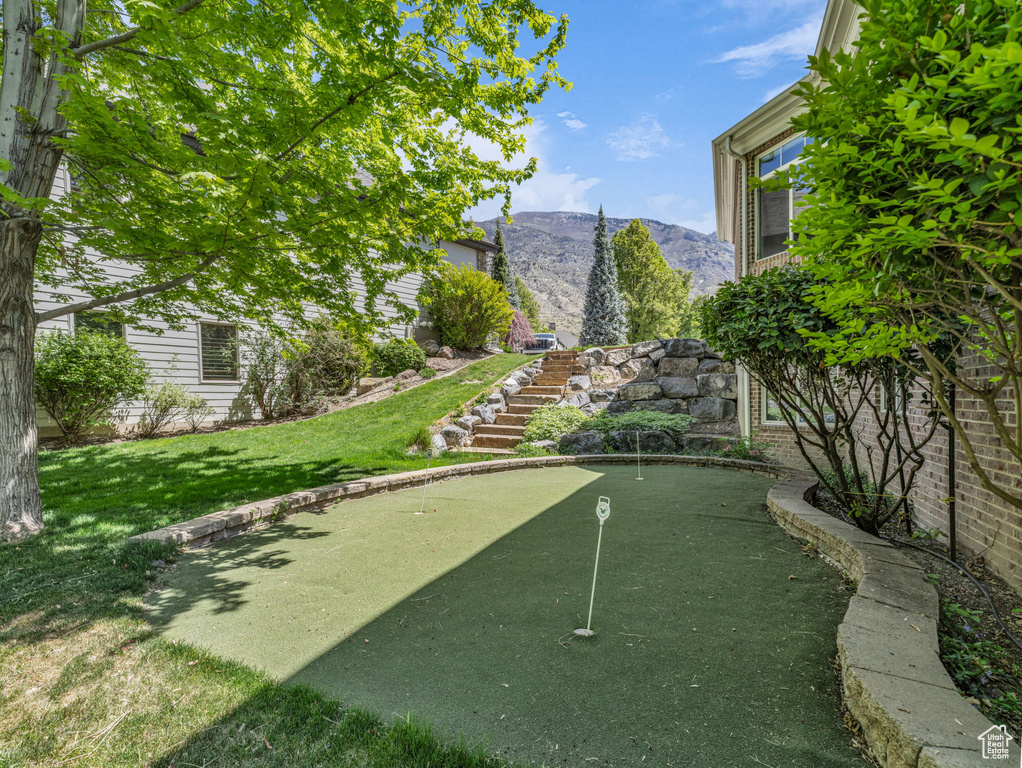 View of yard featuring stairway and a mountain view