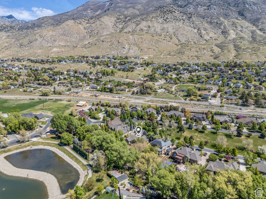Bird's eye view with a residential view and a water and mountain view