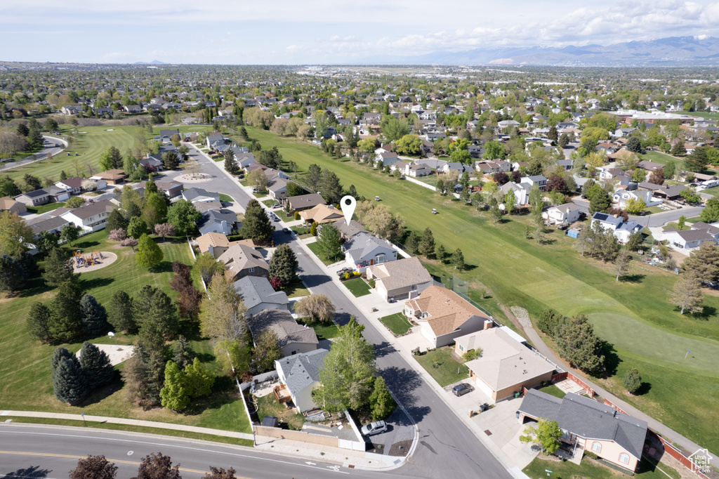 Bird\'s eye view with a residential view, a mountain view, and golf course view
