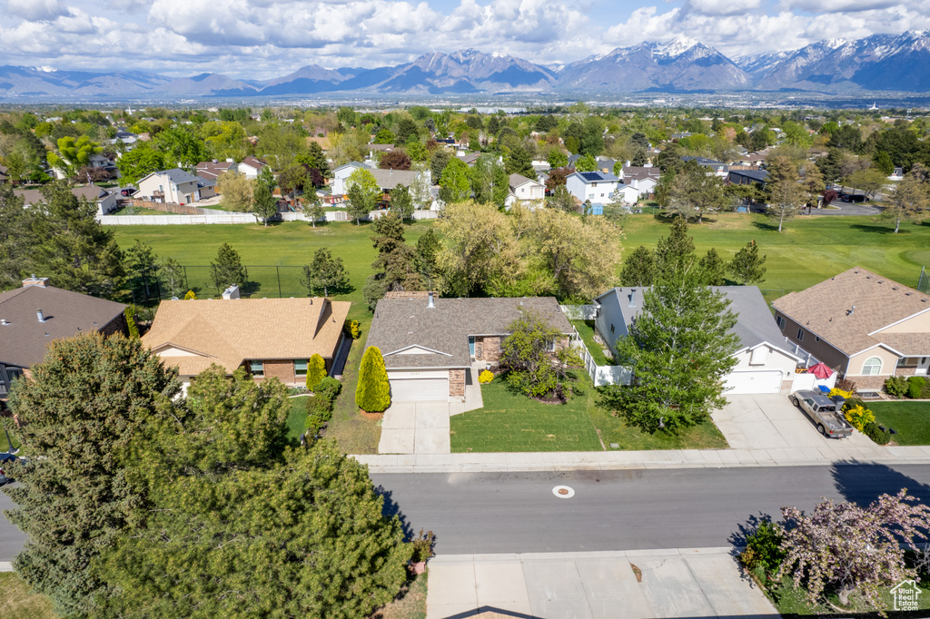 Birds eye view of property featuring a residential view and a mountain view