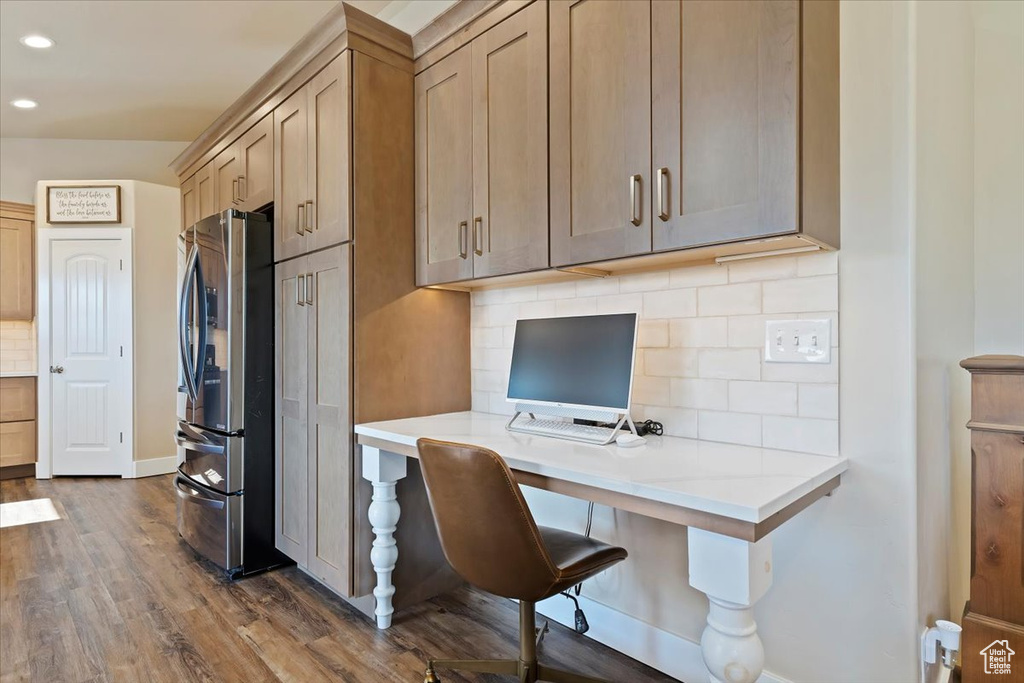 Office space with dark wood-style flooring, recessed lighting, baseboards, and built in study area