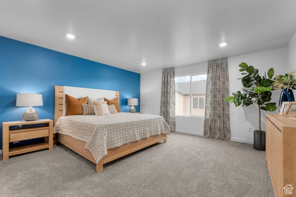 Bedroom featuring carpet floors, recessed lighting, and baseboards
