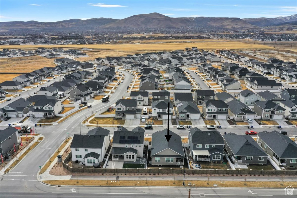 Drone / aerial view with a residential view and a mountain view