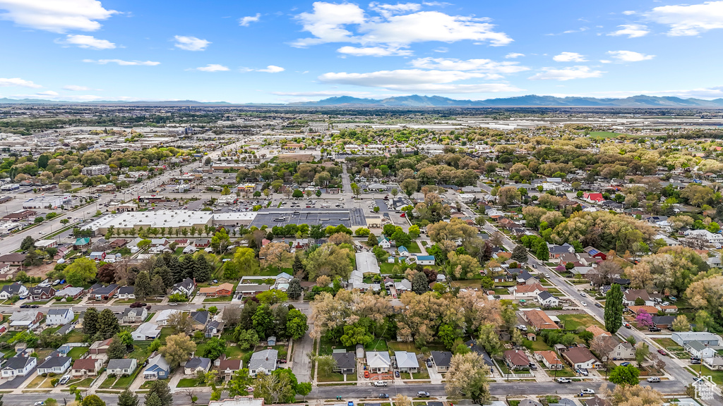 Birds eye view of property featuring a residential view and a mountain view
