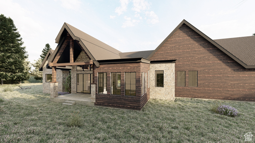 Rear view of house featuring a lawn and stone siding