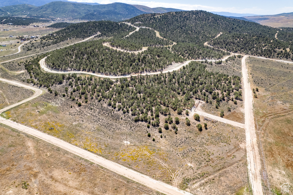 Drone / aerial view with a mountain view and a rural view