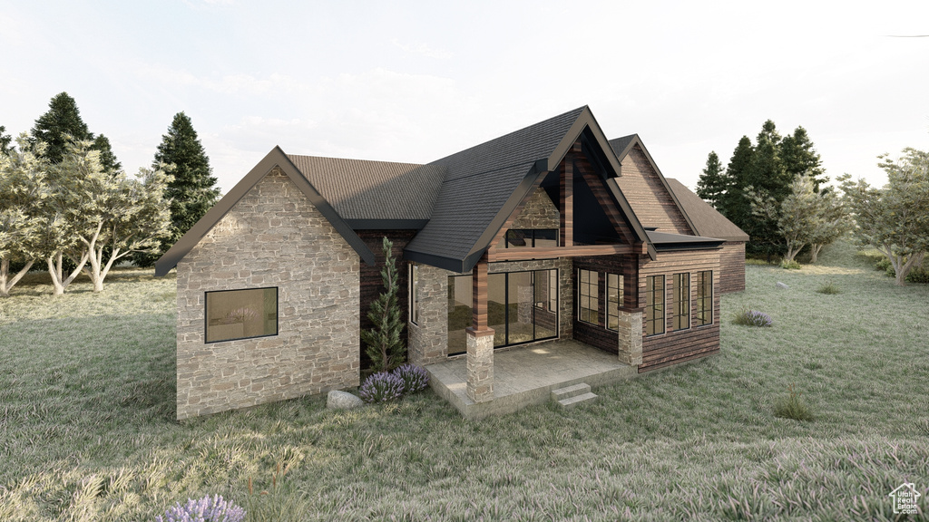 Rear view of property featuring a lawn, a shingled roof, and stone siding