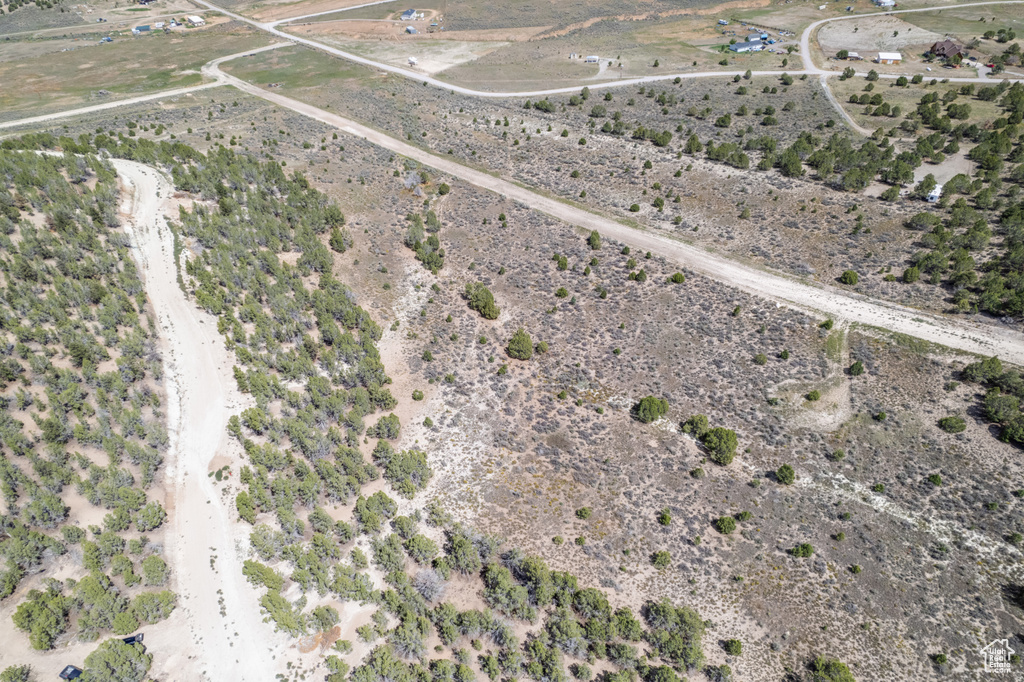 Drone / aerial view featuring a rural view and a desert view
