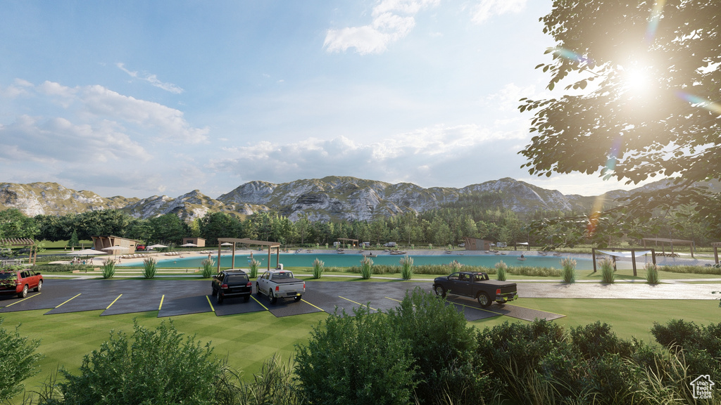 View of tennis court with a pool and a water and mountain view