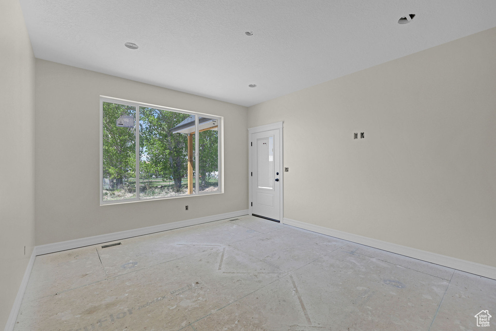 Empty room with baseboards