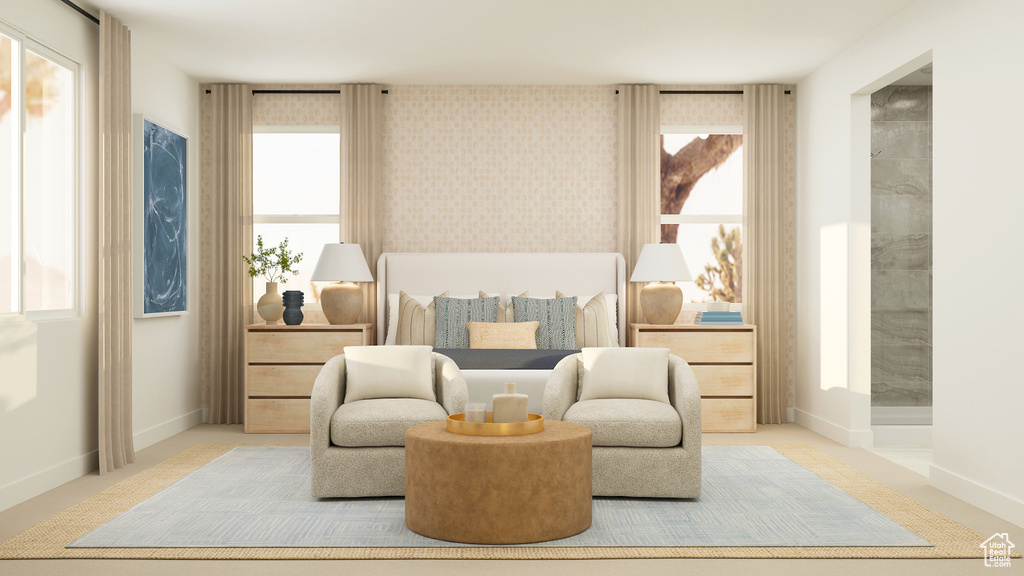 Sitting room featuring baseboards and wallpapered walls