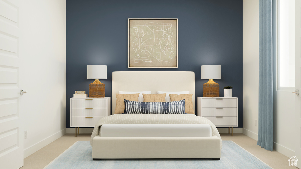 Carpeted bedroom with baseboards