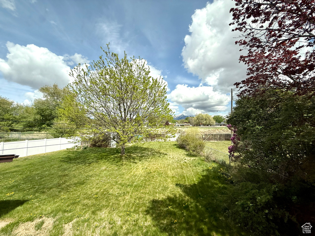 View of yard with fence