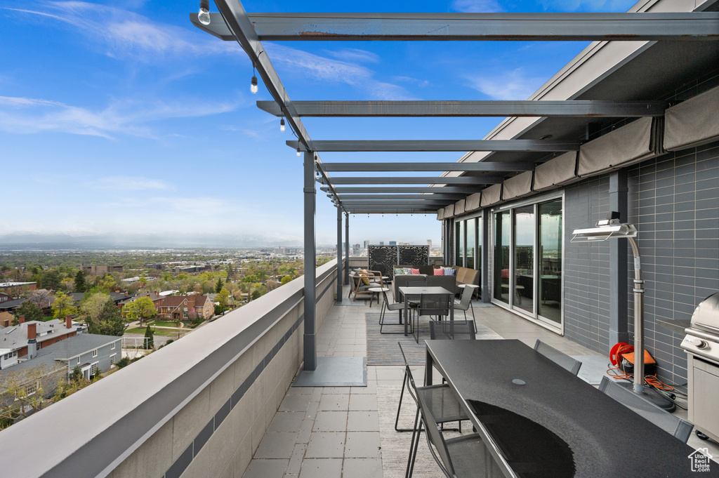 Balcony featuring outdoor dining space