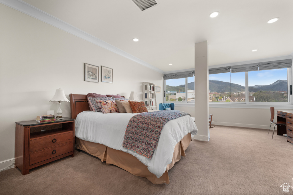 Bedroom featuring visible vents, ornamental molding, baseboards, recessed lighting, and light colored carpet