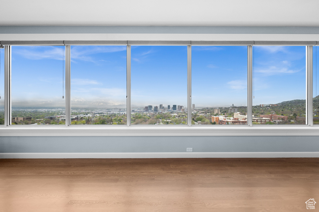 Interior space featuring a healthy amount of sunlight and a view of city