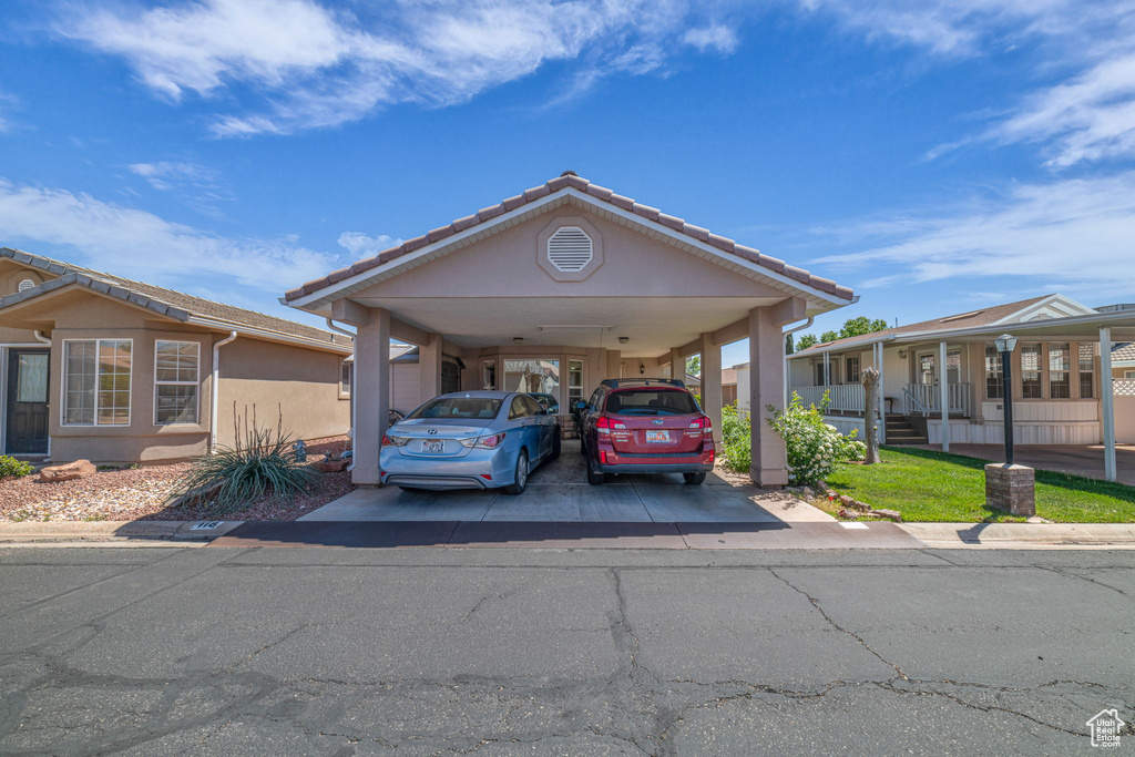 View of car parking with a carport