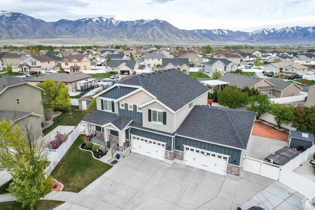 Birds eye view of property featuring a residential view and a mountain view