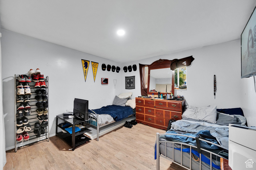 Bedroom featuring wood finished floors