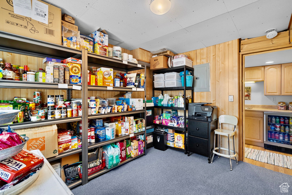 Storage room featuring beverage cooler
