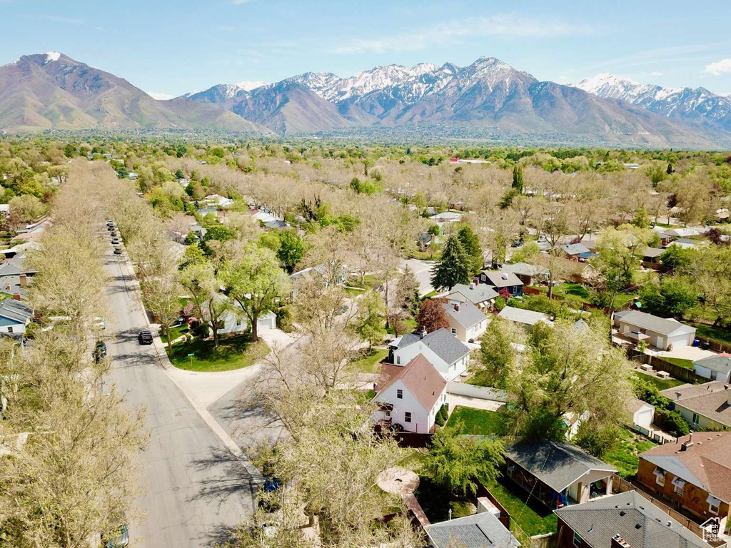 Birds eye view of property featuring a residential view and a mountain view