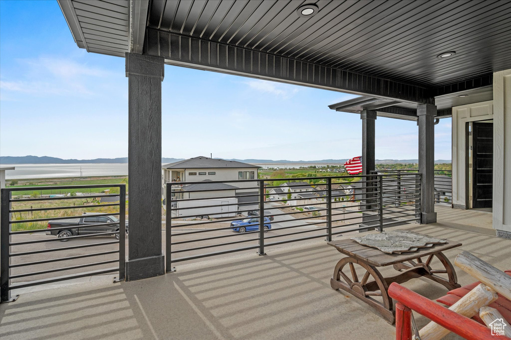 Exterior space featuring a mountain view and a balcony