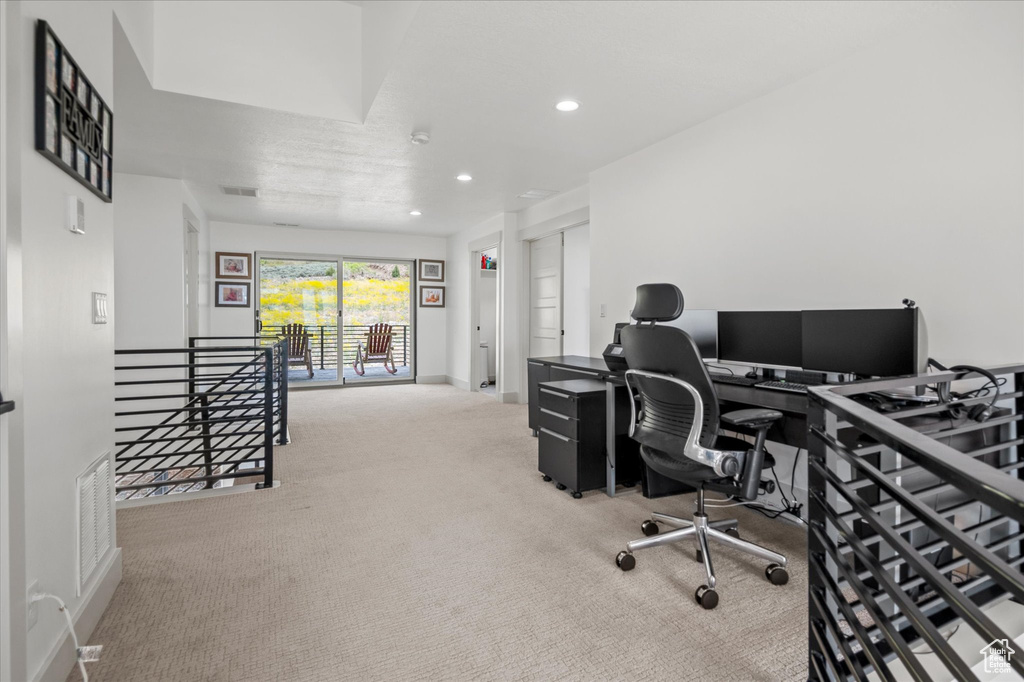 Office space featuring baseboards, carpet flooring, recessed lighting, and visible vents