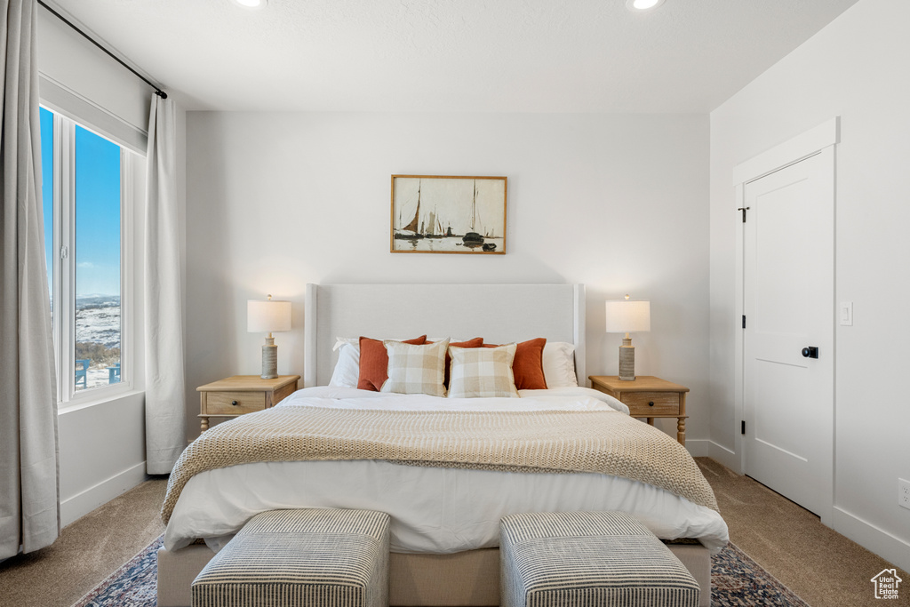 Bedroom with carpet flooring, recessed lighting, and baseboards