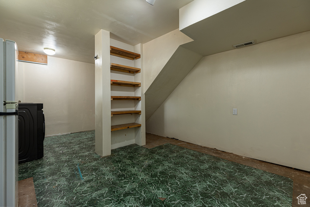 Finished basement with visible vents