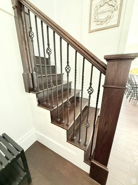Stairs featuring baseboards
