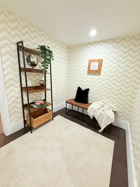 Sitting room featuring recessed lighting, baseboards, and wallpapered walls