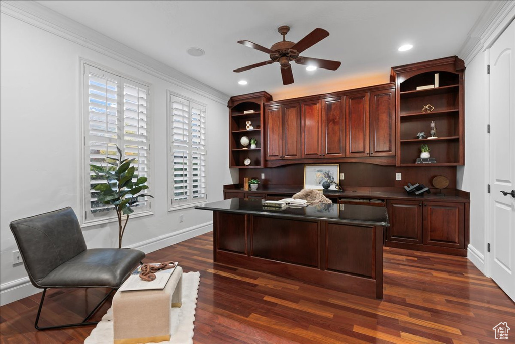 Home office featuring built in study area, baseboards, ceiling fan, dark wood-style floors, and recessed lighting