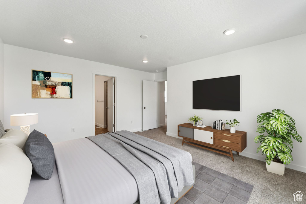 Bedroom with recessed lighting, baseboards, and light colored carpet