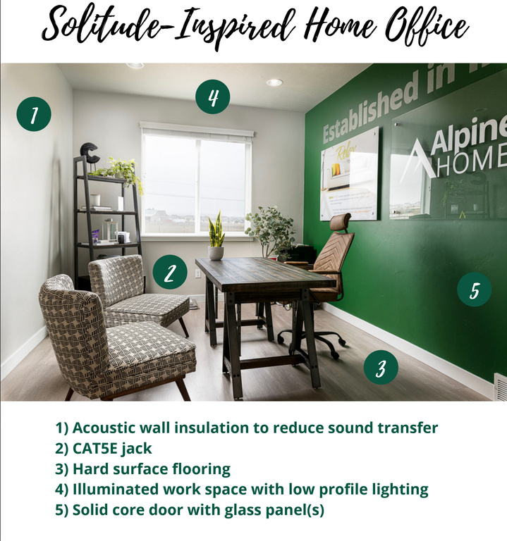 Office space with baseboards and wood finished floors